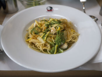 Close-up of pasta served in plate on table