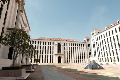 Buildings in city against sky