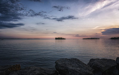 Scenic view of sea against sky during sunset