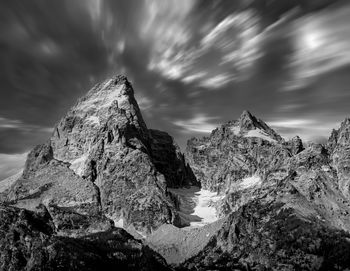 Rock formations on land against sky