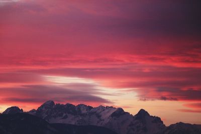 Scenic view of mountains against dramatic sky