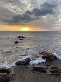 Scenic view of sea against sky during sunset