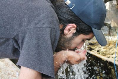 Young couple kissing in water