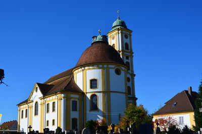 Low angle view of cathedral against clear blue sky