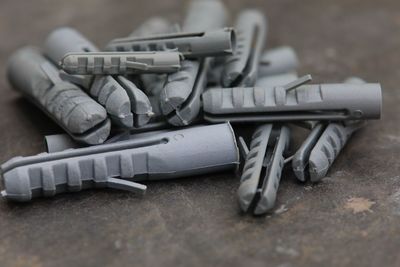 Close-up of screws on table