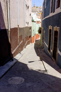 Narrow alley amidst buildings