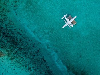 Aerial view of seaplane on sea