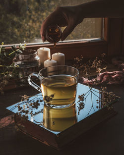 Glass of tea cup on table