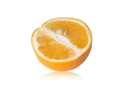 Close-up of orange slice against white background