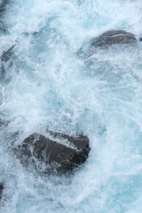 High angle view of waves in sea