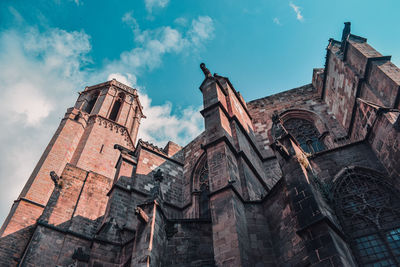 Low angle view of old building against sky