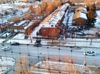 High angle view of buildings in city during winter