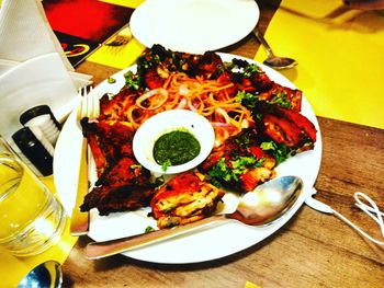 Close-up of served food on table