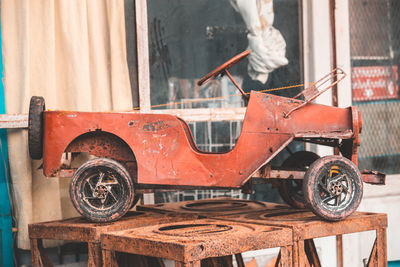 Close-up of old rusty toy car