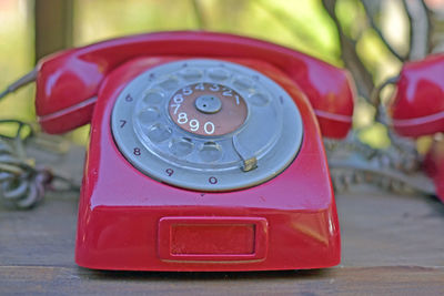 Close-up of old landline phone on table