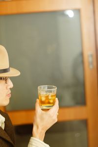 Young woman drinking glass