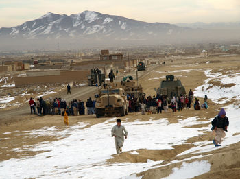 Group of people on snow covered land