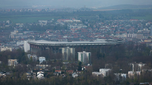 High angle view of townscape against sky in city