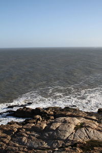 Scenic view of sea against clear sky