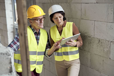 Engineers brainstorming at construction site