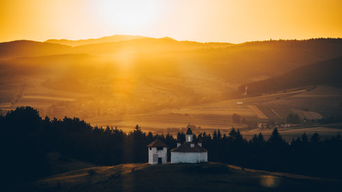 Scenic view of landscape against sky during sunset