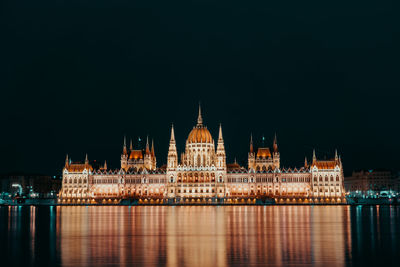 Illuminated buildings in water