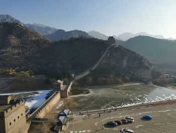 High angle view of cars on mountain against sky