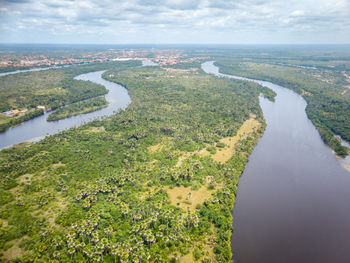 High angle view of river amidst landscape against sky