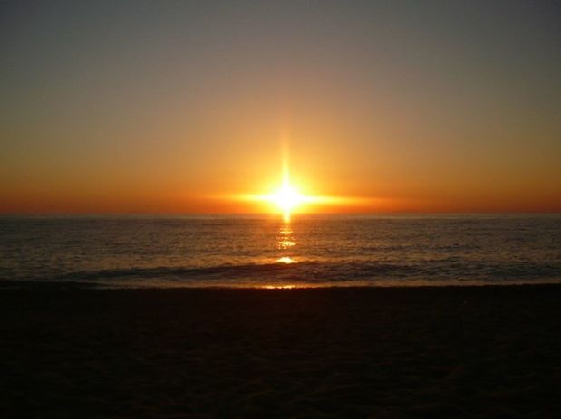 VIEW OF SEA AT SUNSET