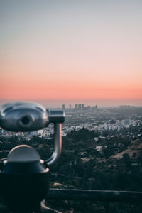 View of cityscape against sky during sunset