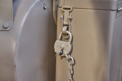 Close-up of chain and padlock on metal