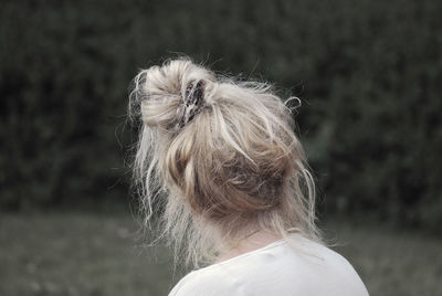 Rear view of woman with hair bun