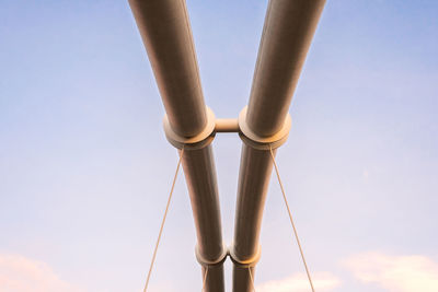 Low angle view of pole against clear blue sky