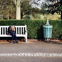 Boy playing with umbrella