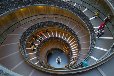 High angle view of people on spiral staircase at vatican museums