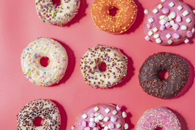 Directly above shot of donuts on blue background