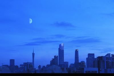 View of buildings against cloudy sky