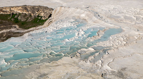 High angle view of surf on shore