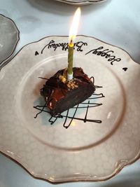 High angle view of candles on cake