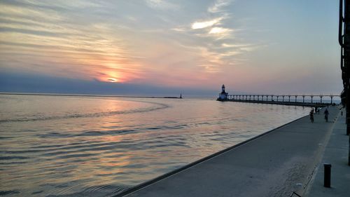 Scenic view of sea against sky at sunset