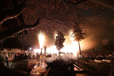 Group of people in city at night
