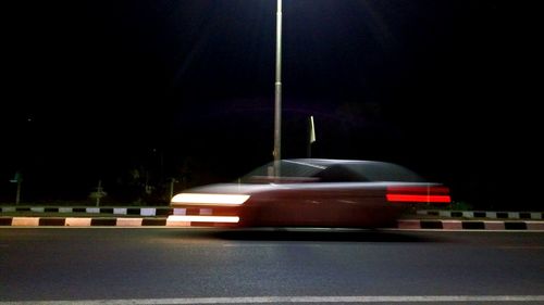 Illuminated car at night