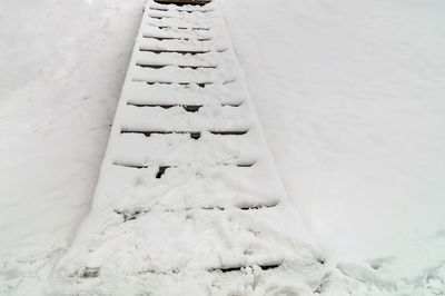 High angle view of snow covered field