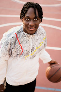 Portrait of the black man with the basketball