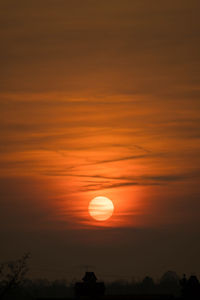 Scenic view of silhouette landscape against romantic sky at sunset