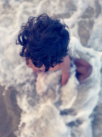 High angle view portrait of child on land