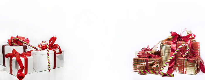 Low angle view of christmas decoration in box against white background