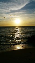 Scenic view of sea at sunset