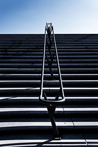 Low angle view of steps against clear sky