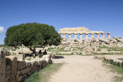 Old ruins of temple against clear sky